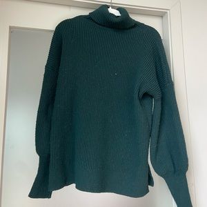 Dark green turtleneck sweater